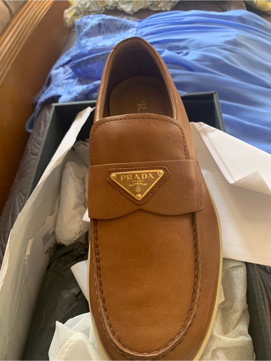 Prada Other - Prada Tan Leather Penny Loafers with Gold Triangle Plaque